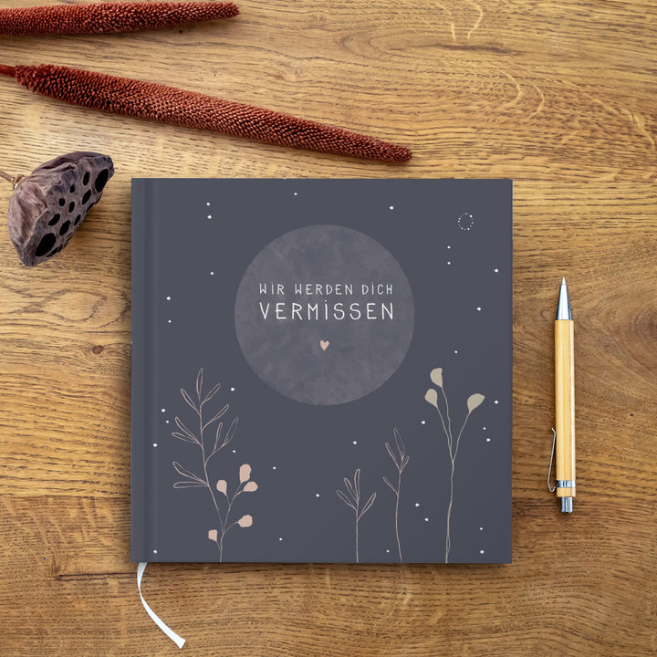 Blaues Kondolenzbuch zur Trauerfeier - wir werden dich vermissen - hochwertiges Design mit Blumen, stabiler Einband, 100 S, Blanko, 21x21cm