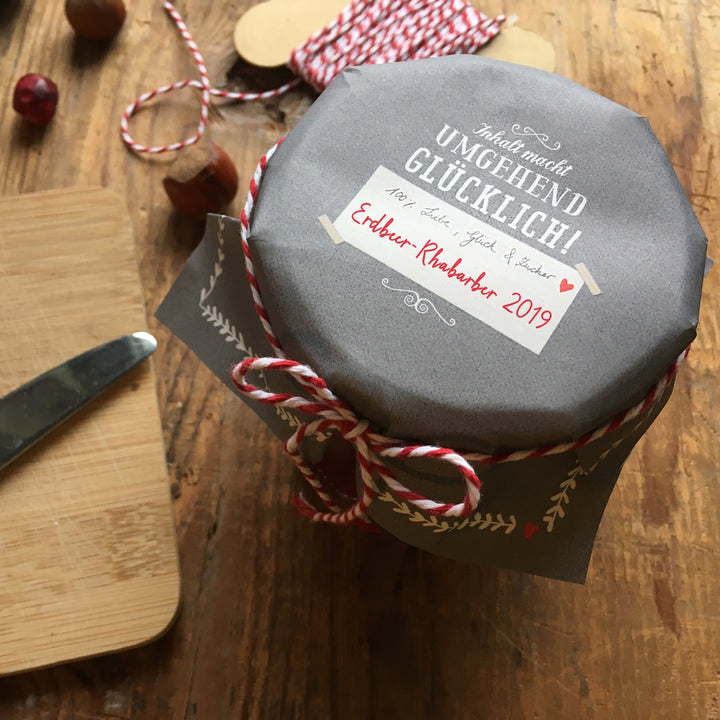 25 Marmeladendeckchen - umgehend Glücklich | Gläserdeckchen Grau Weiß für Marmelade & Einmachgläser | Recyclingpapier Abreißblock + 10 m Garn + Justiergummi