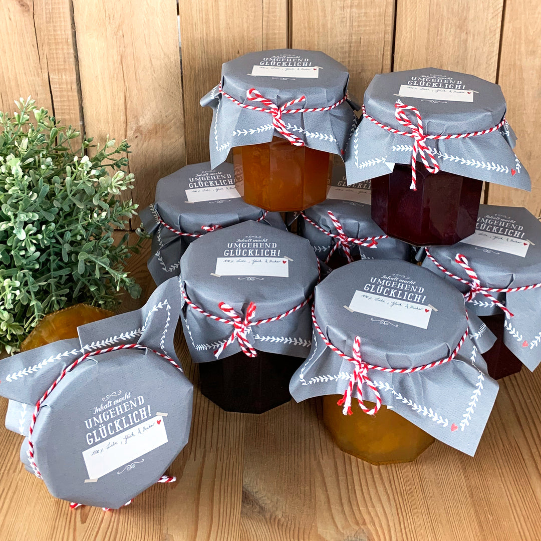 25 Marmeladendeckchen - umgehend Glücklich | Gläserdeckchen Grau Weiß für Marmelade & Einmachgläser | Recyclingpapier Abreißblock + 10 m Garn + Justiergummi