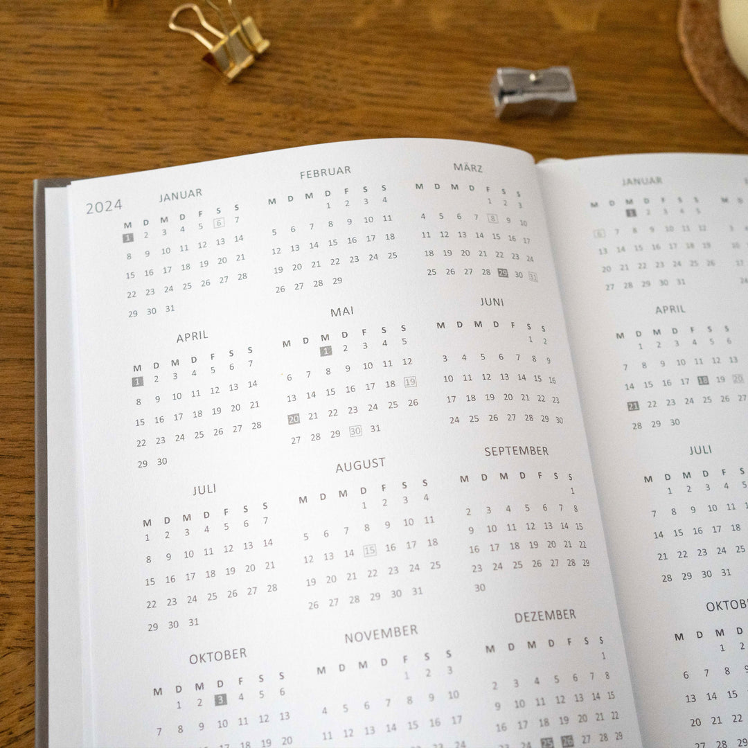 A5 Terminkalender - Kalender ohne Jahr quer | Wochenplaner und Achtsamkeit Notizbuch | Hardcover Taschenkalender & Terminplaner | Grau Beige Weiß, Blumen